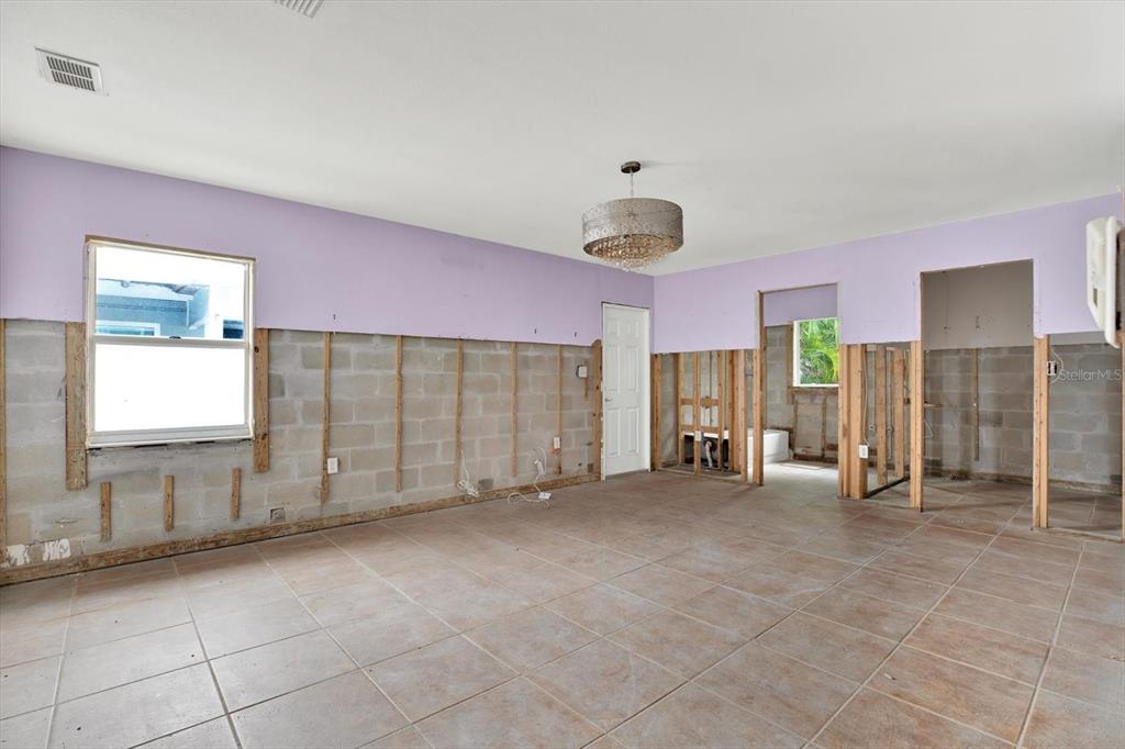 16218 1st Street East Redington Beach, FL 33708 - Photo 7 of 20 a view of empty room with window