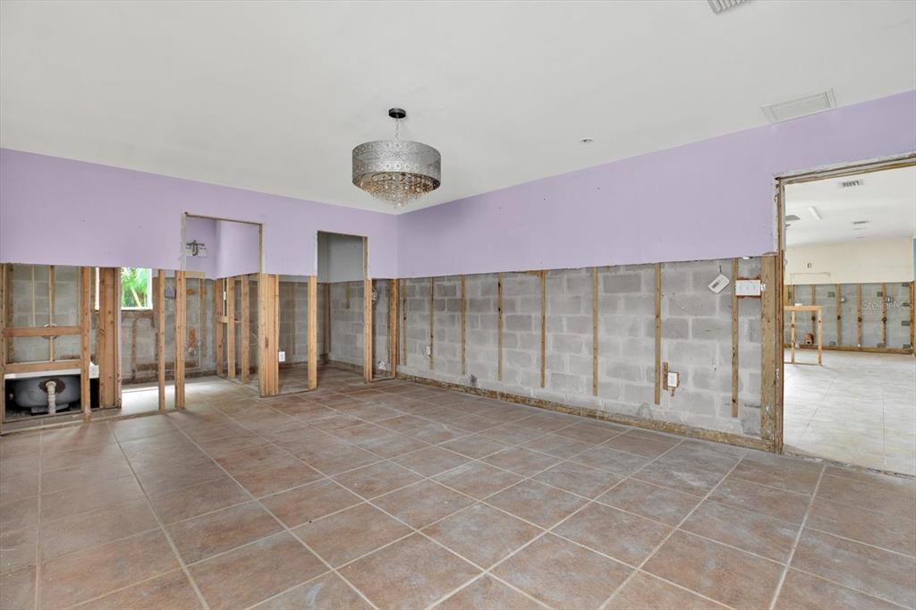 16218 1st Street East Redington Beach, FL 33708 - Photo 8 of 20 a view of an empty room with a window