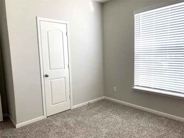 an empty room with window