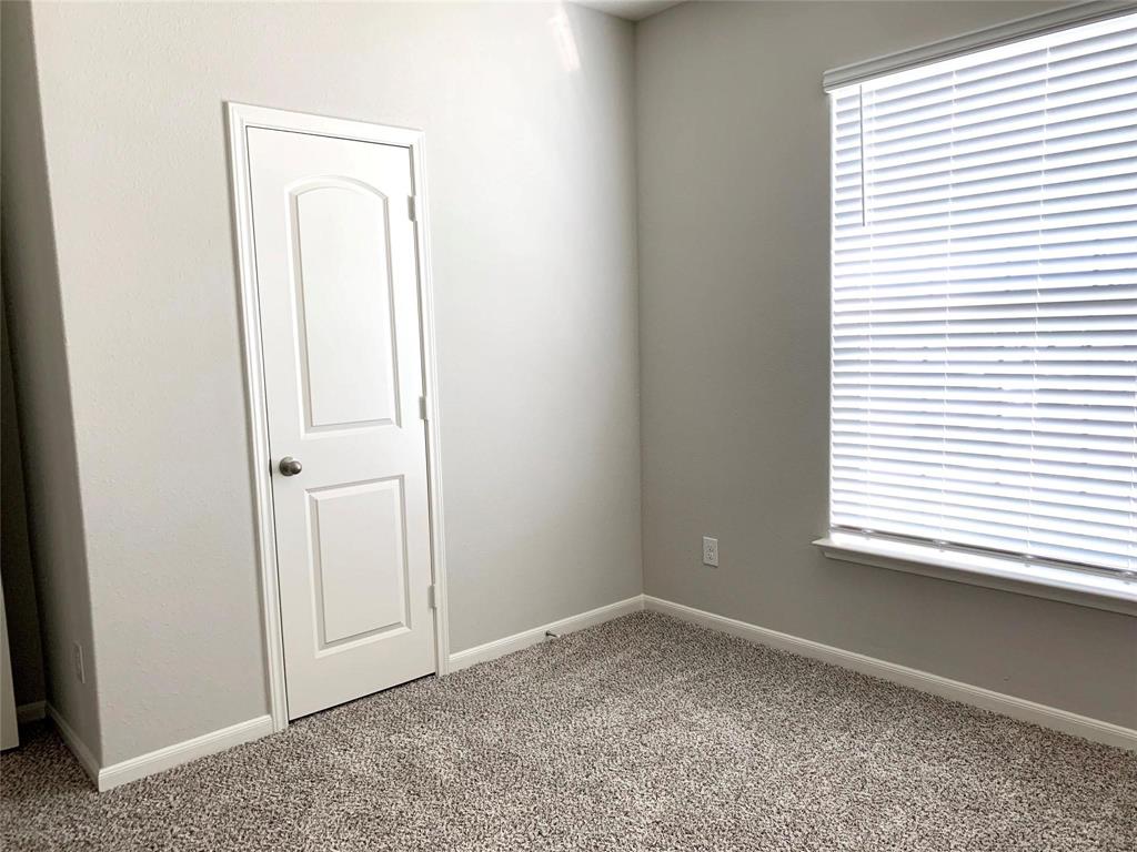 144 Emma Drive Anna, TX 75409 - Photo 14 of 34 an empty room with a window