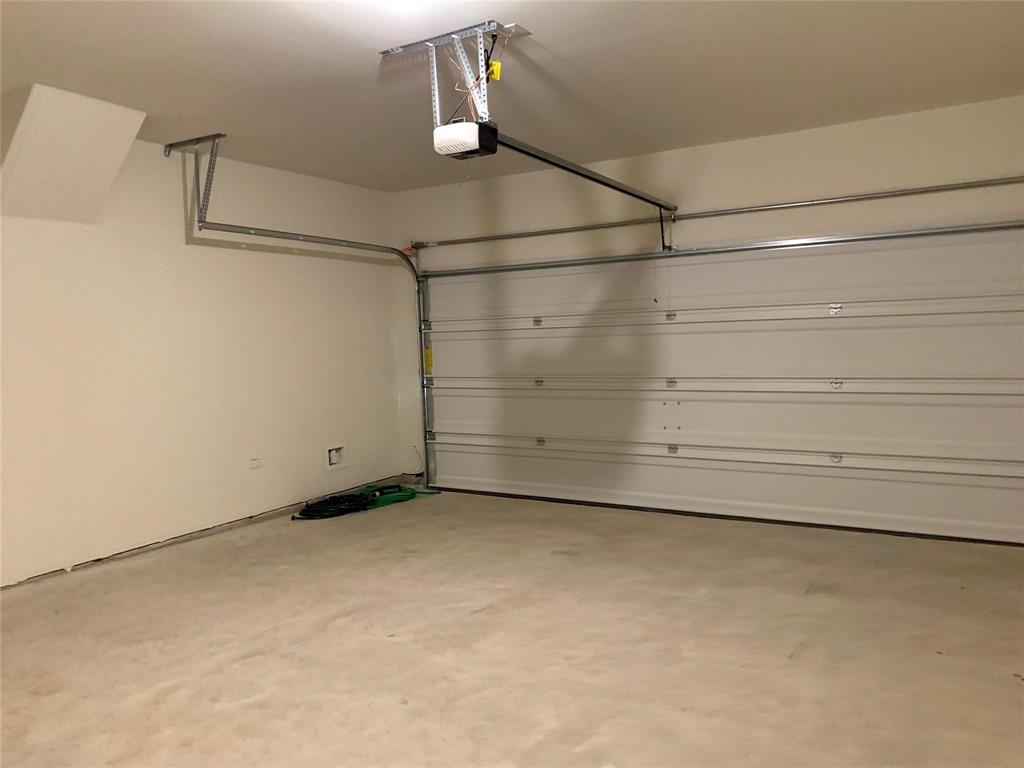 144 Emma Drive Anna, TX 75409 - Photo 28 of 34 a view of a room with racks on the wall