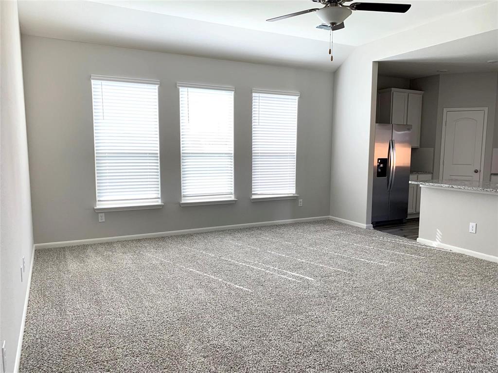 144 Emma Drive Anna, TX 75409 - Photo 3 of 34 a view of an empty room with a window
