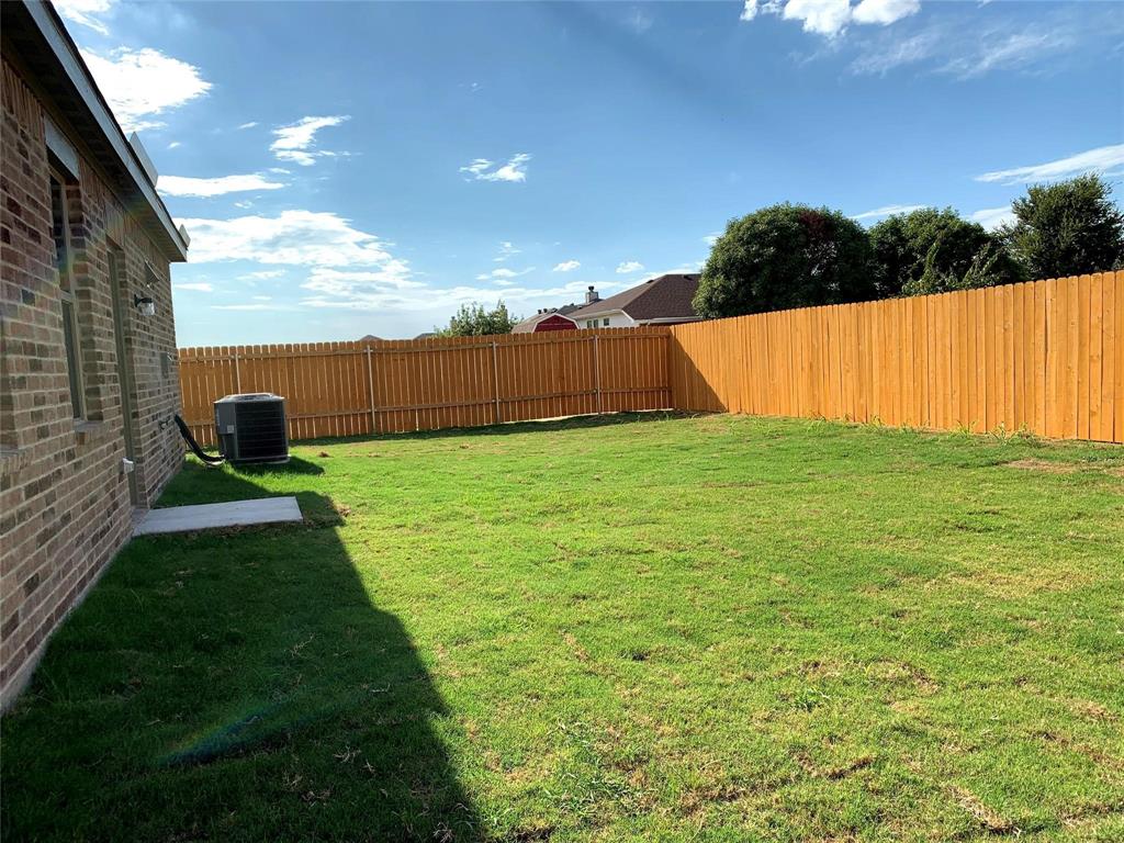 144 Emma Drive Anna, TX 75409 - Photo 31 of 34 a view of an outdoor space and a yard