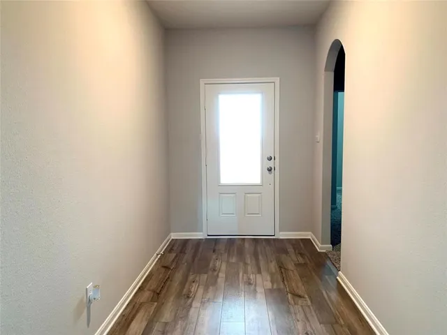 a kitchen with a refrigerator stove and microwave