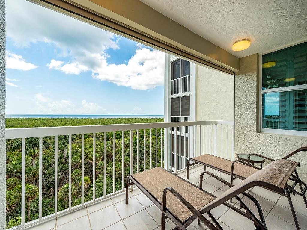 6573 Marissa Loop, Unit 802 Naples, FL 34108 - Photo 12 of 12 a view of a balcony with chairs