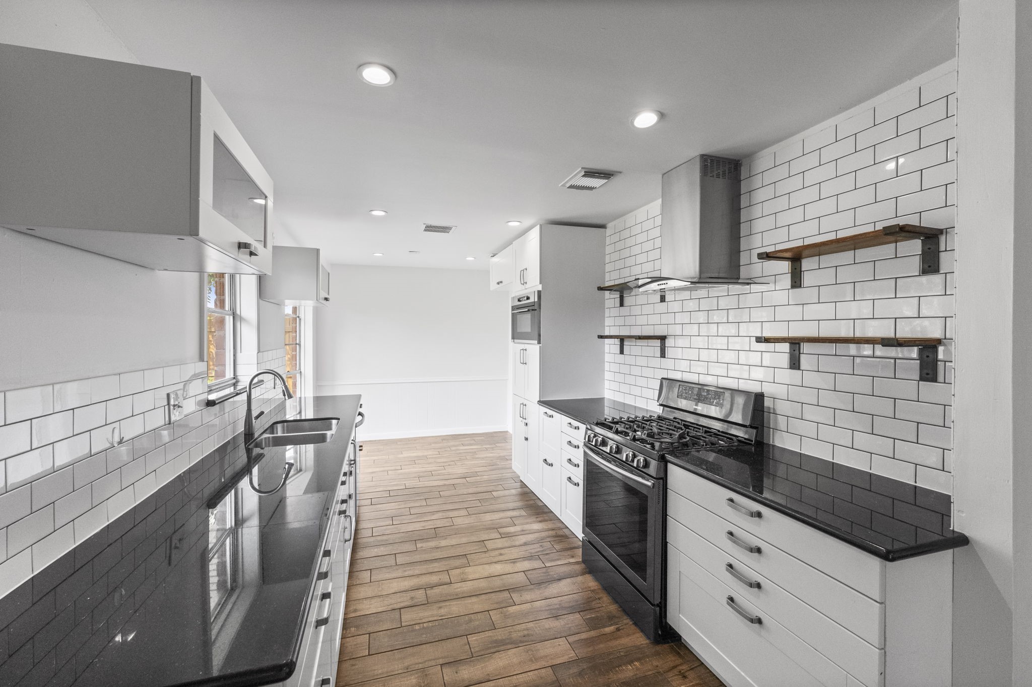 9735 Kemp Forest Drive Houston, TX 77080 - Photo 11 of 25 Hardware on the cabinets add style and function.