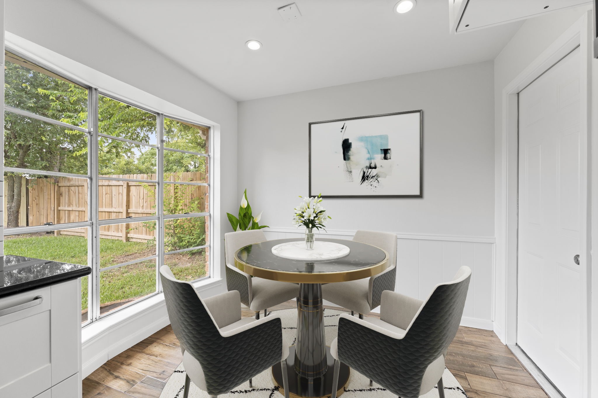 9735 Kemp Forest Drive Houston, TX 77080 - Photo 12 of 25 Spacious breakfast nook is a great spot for morning coffee. *Virtually Staged