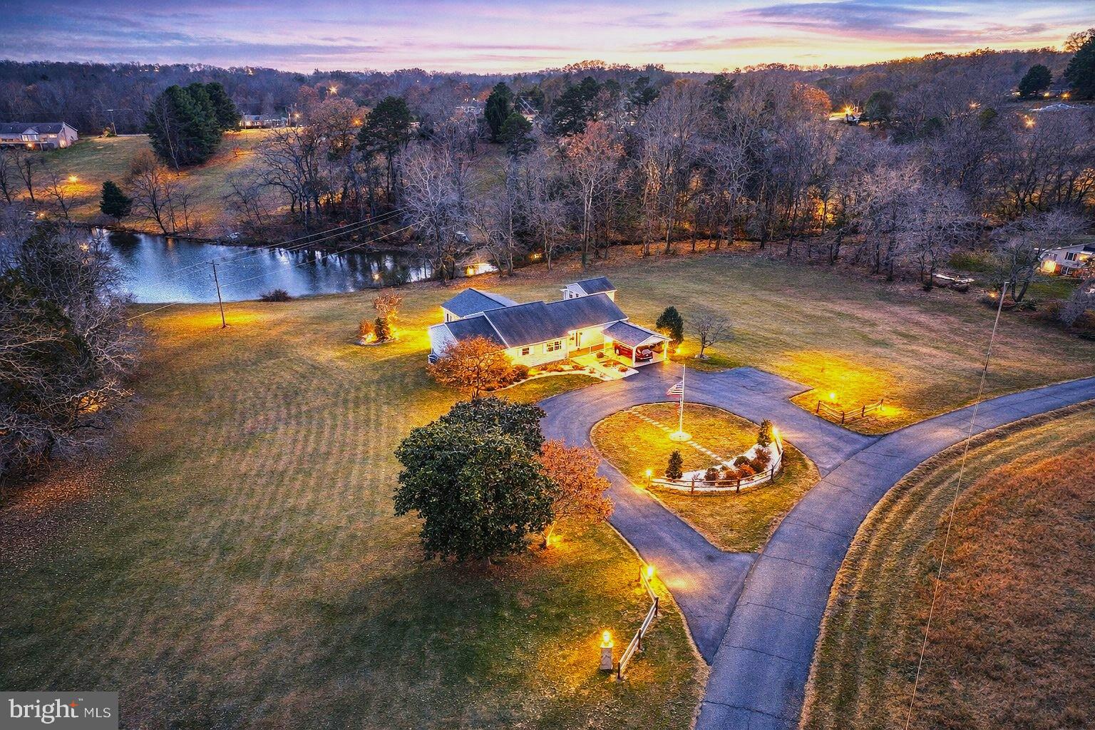 a view of a swimming pool with a yard