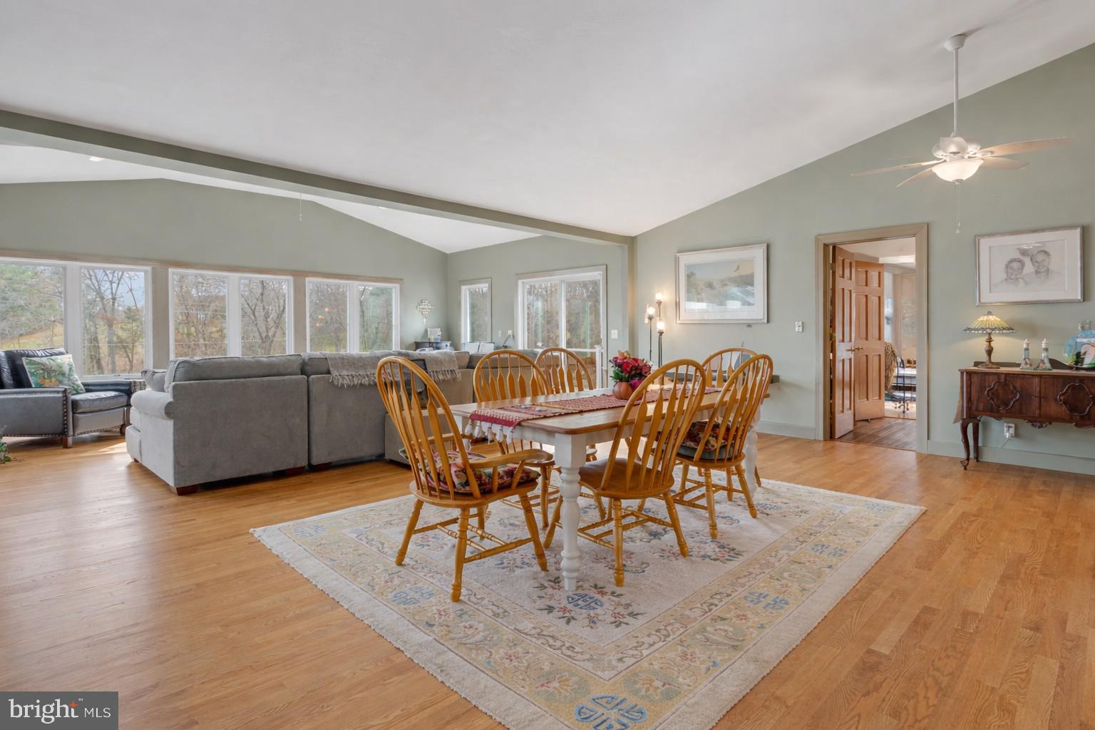 65 Chestnut Rail Lane Madison, VA 22727 - Photo 13 of 50 a view of a dining room with furniture and wooden floor