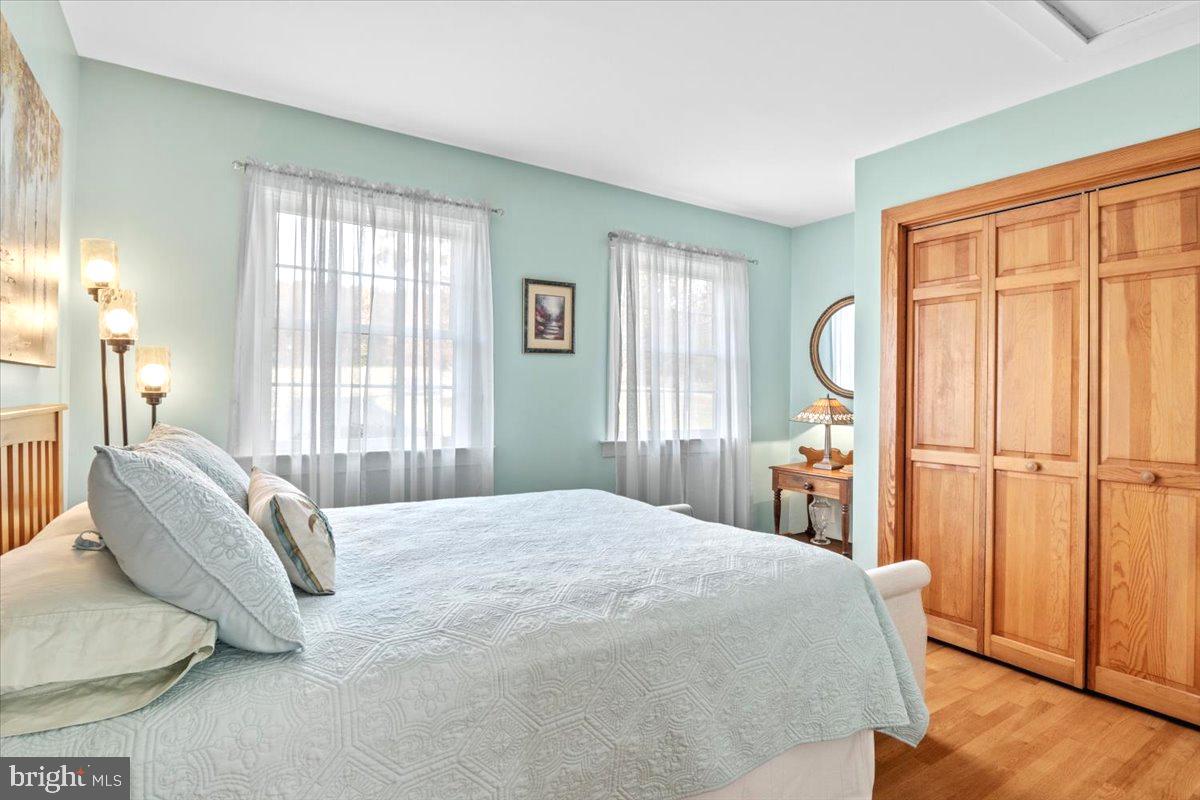 65 Chestnut Rail Lane Madison, VA 22727 - Photo 15 of 50 a bedroom with a bed dresser and a large window