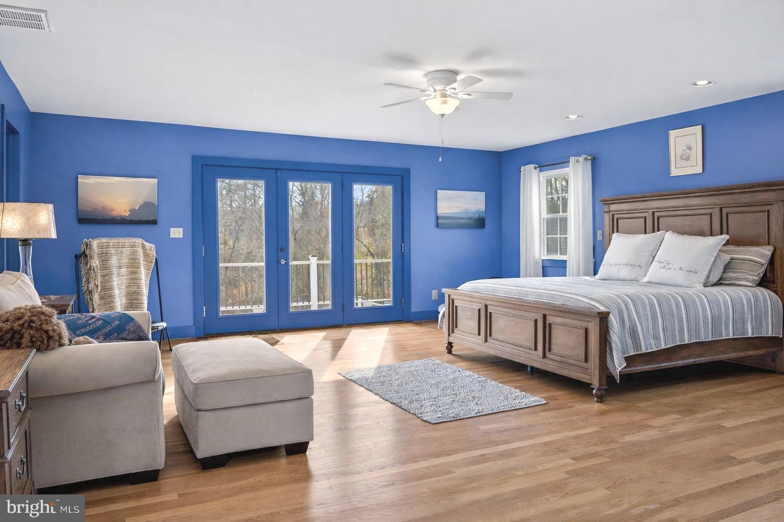 65 Chestnut Rail Lane Madison, VA 22727 - Photo 19 of 50 a bedroom with a bed couch and window