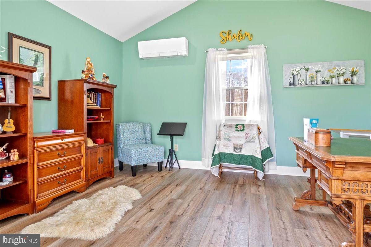 65 Chestnut Rail Lane Madison, VA 22727 - Photo 24 of 50 a reading room with furniture and wooden floor