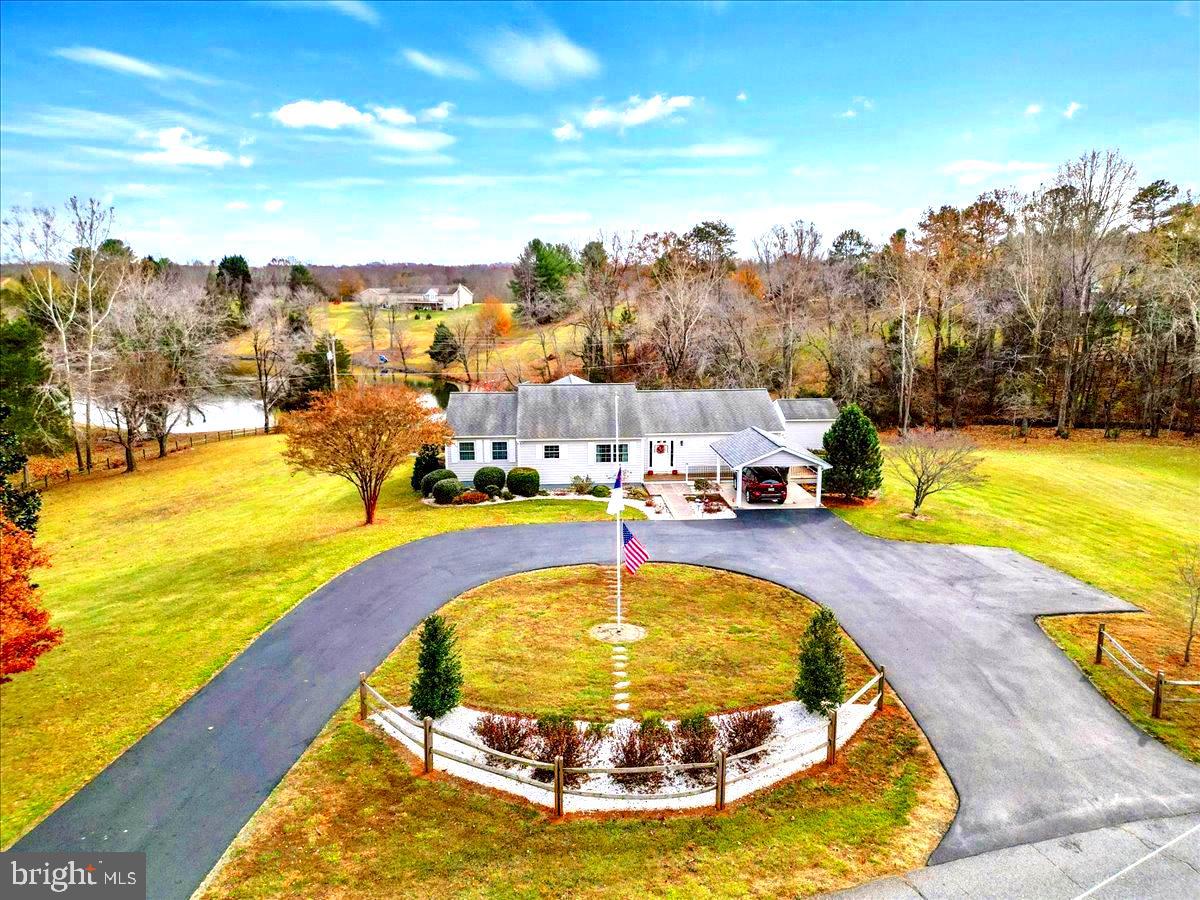 65 Chestnut Rail Lane Madison, VA 22727 - Photo 27 of 50 a view of a swimming pool with an ocean view