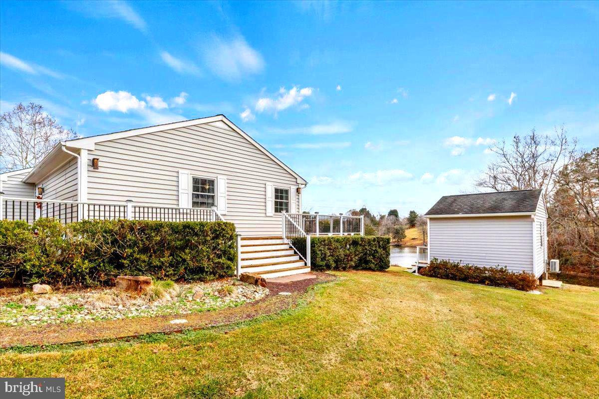 65 Chestnut Rail Lane Madison, VA 22727 - Photo 30 of 50 a view of a house with a yard