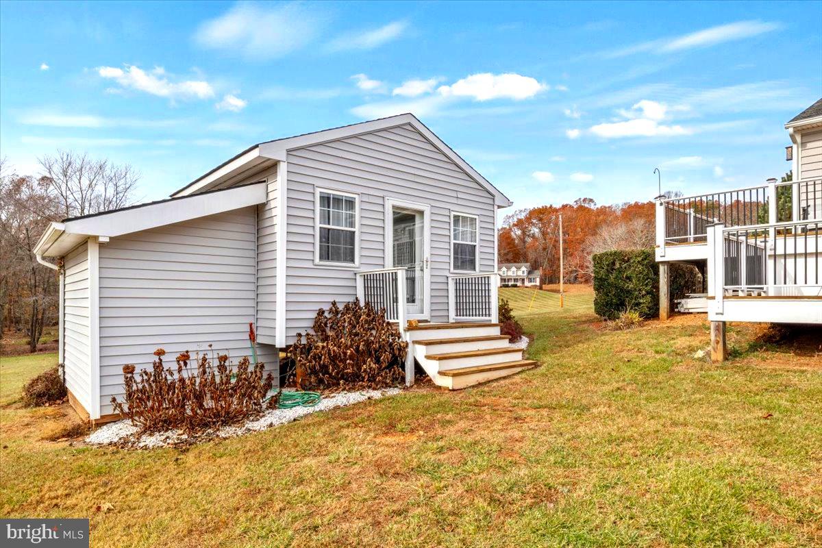 65 Chestnut Rail Lane Madison, VA 22727 - Photo 32 of 50 a view of a house with a patio