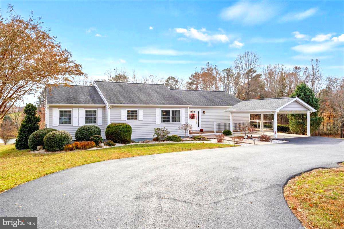65 Chestnut Rail Lane Madison, VA 22727 - Photo 42 of 50 a view of a house with swimming pool and porch with furniture