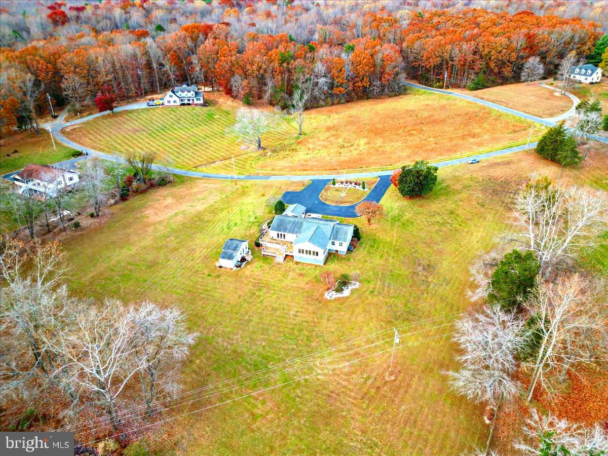 65 Chestnut Rail Lane Madison, VA 22727 - Photo 49 of 50 a view of a swimming pool with an outdoor space and seating area