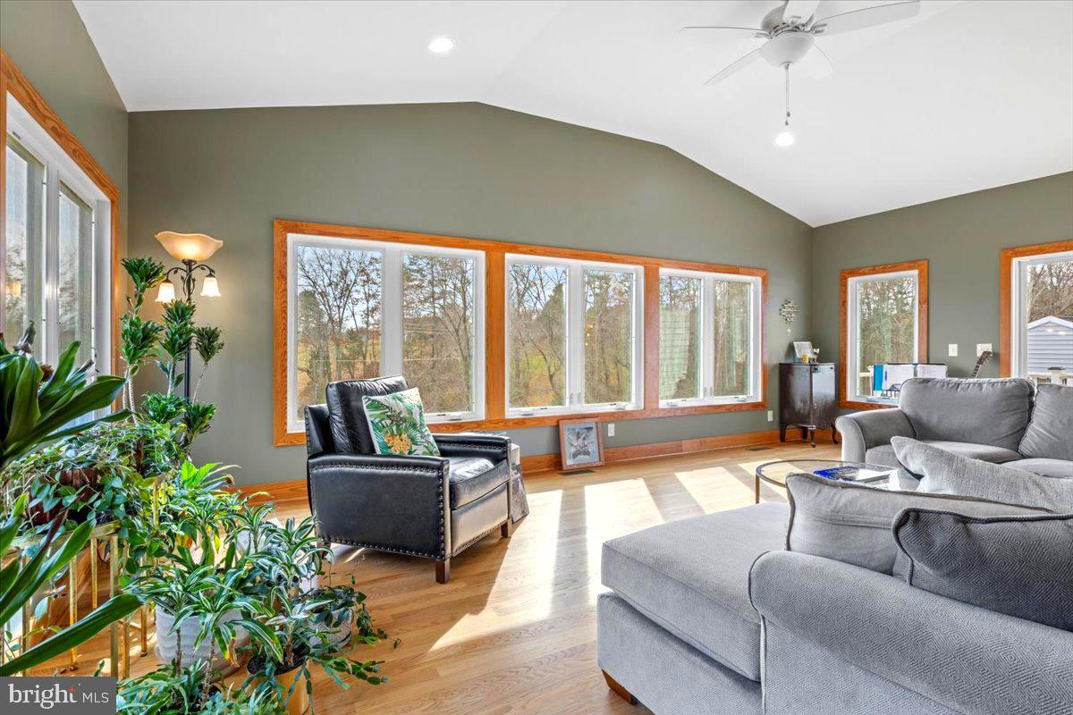 65 Chestnut Rail Lane Madison, VA 22727 - Photo 10 of 50 a living room with furniture and a large window