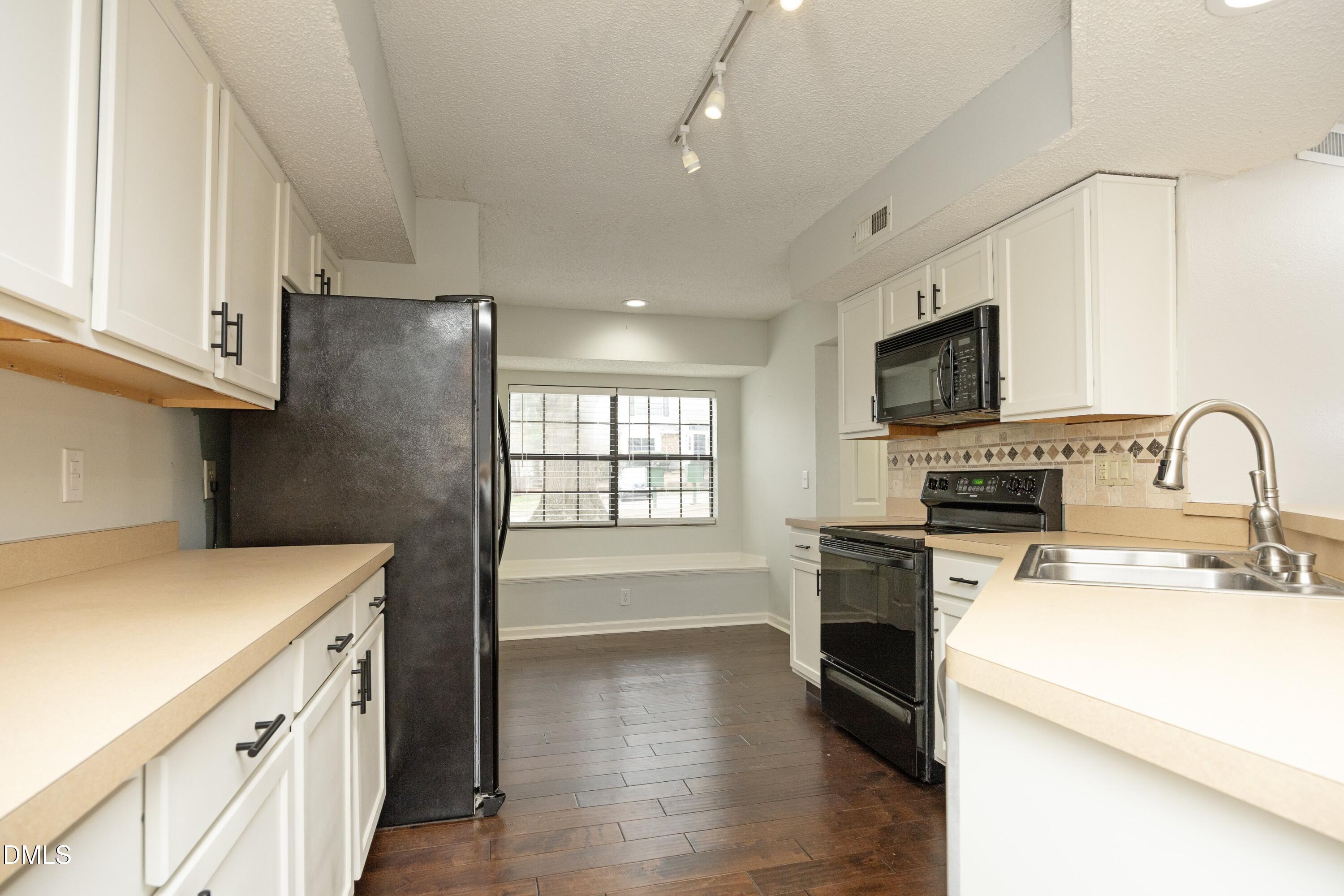 7717 Falcon Rest Circle Raleigh, NC 27615 - Photo 11 of 30 11Kitchen