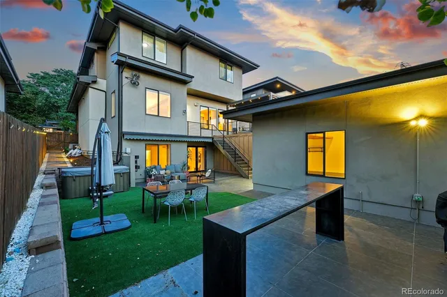 a view of a house with a yard porch and sitting area