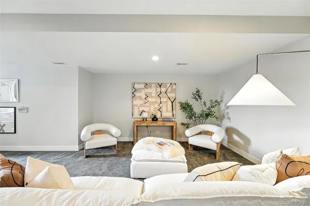 a living room with furniture and a couch