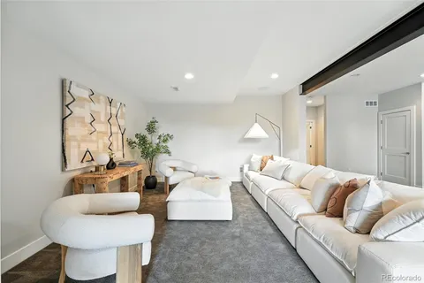 a living room with furniture and a couch