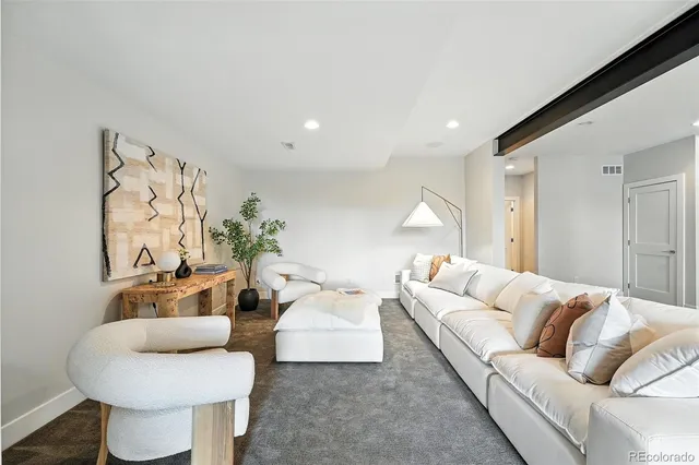 a living room with furniture and a couch