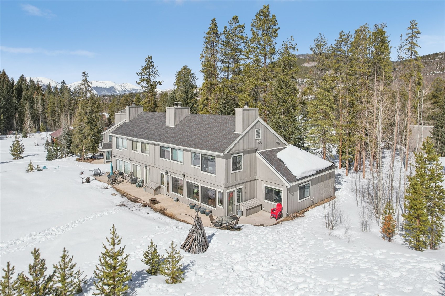 1944 Soda Ridge Road, Unit 1228 Keystone, CO 80435 - Photo 1 of 46 Snow covered house with a chimney