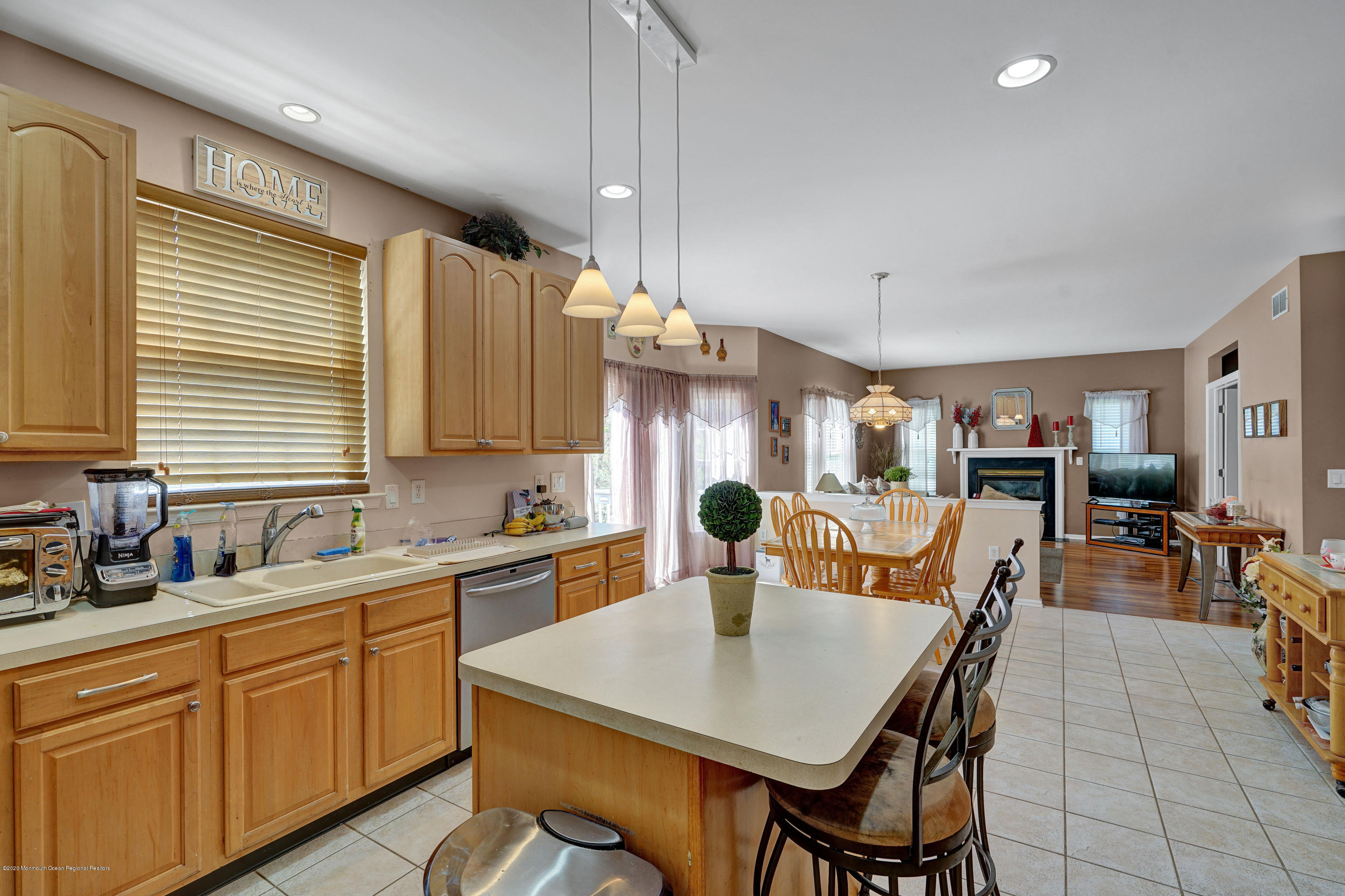 19 Cortelyou Road Jackson, NJ 08527 - Photo 11 of 56 a kitchen with a table chairs sink and cabinets