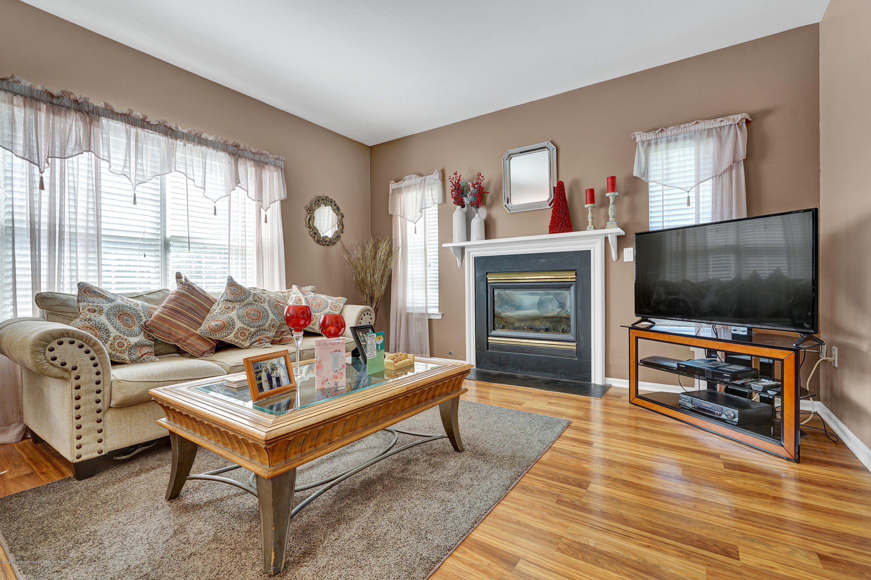 19 Cortelyou Road Jackson, NJ 08527 - Photo 16 of 56 a living room with furniture and a flat screen tv