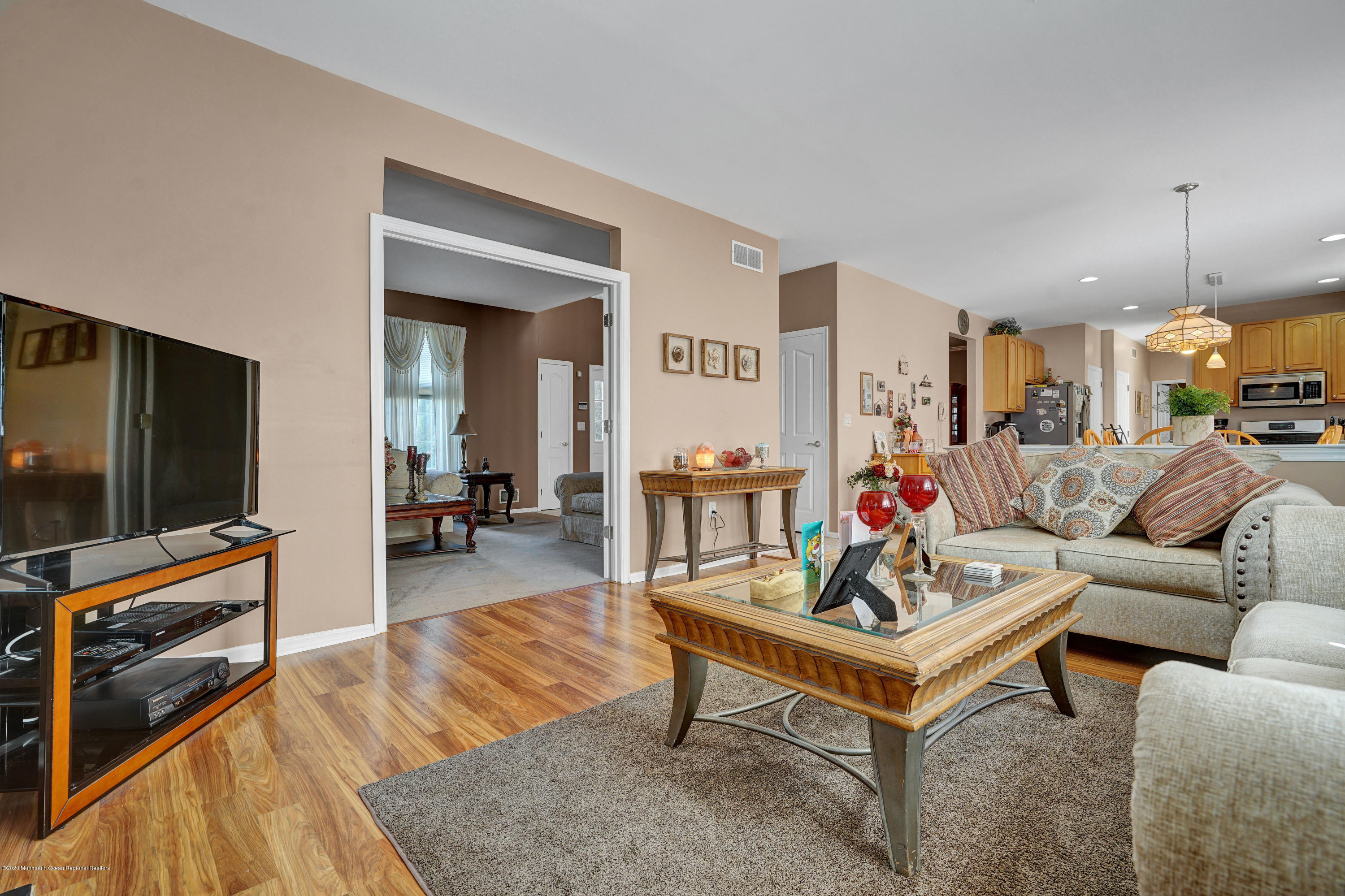 19 Cortelyou Road Jackson, NJ 08527 - Photo 19 of 56 a living room with furniture and a flat screen tv