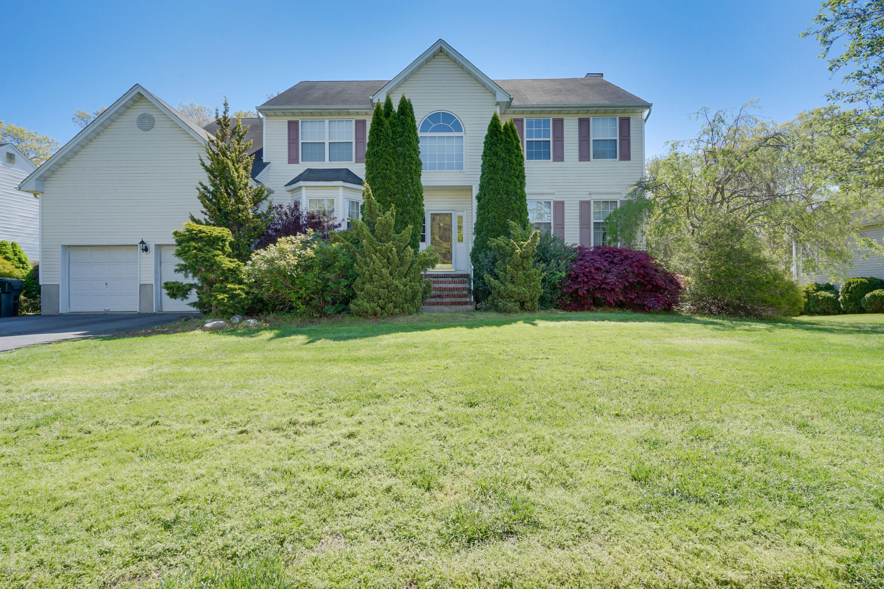 19 Cortelyou Road Jackson, NJ 08527 - Photo 2 of 56 a front view of house with yard and green space