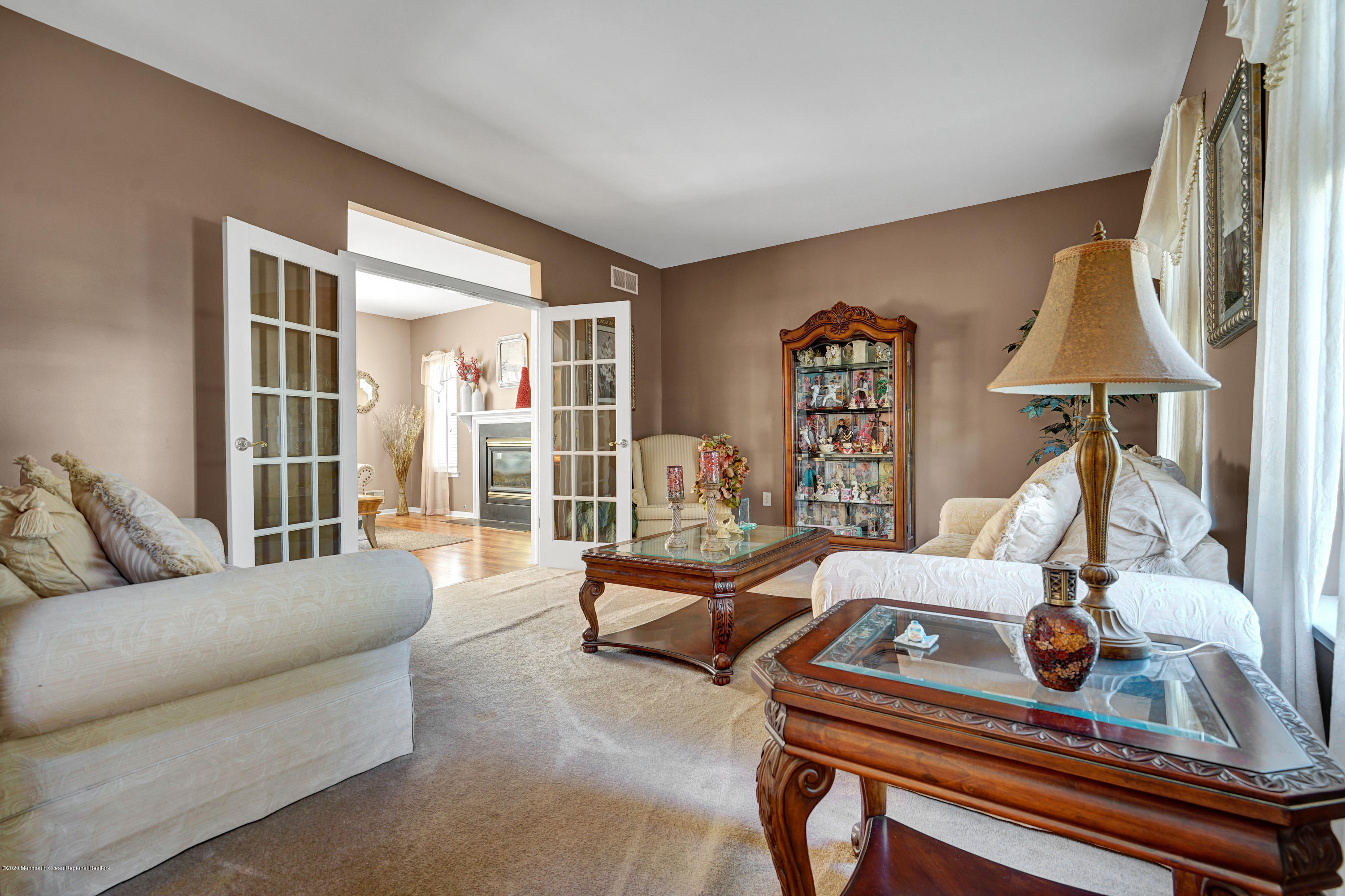 19 Cortelyou Road Jackson, NJ 08527 - Photo 24 of 56 a living room with furniture and a window
