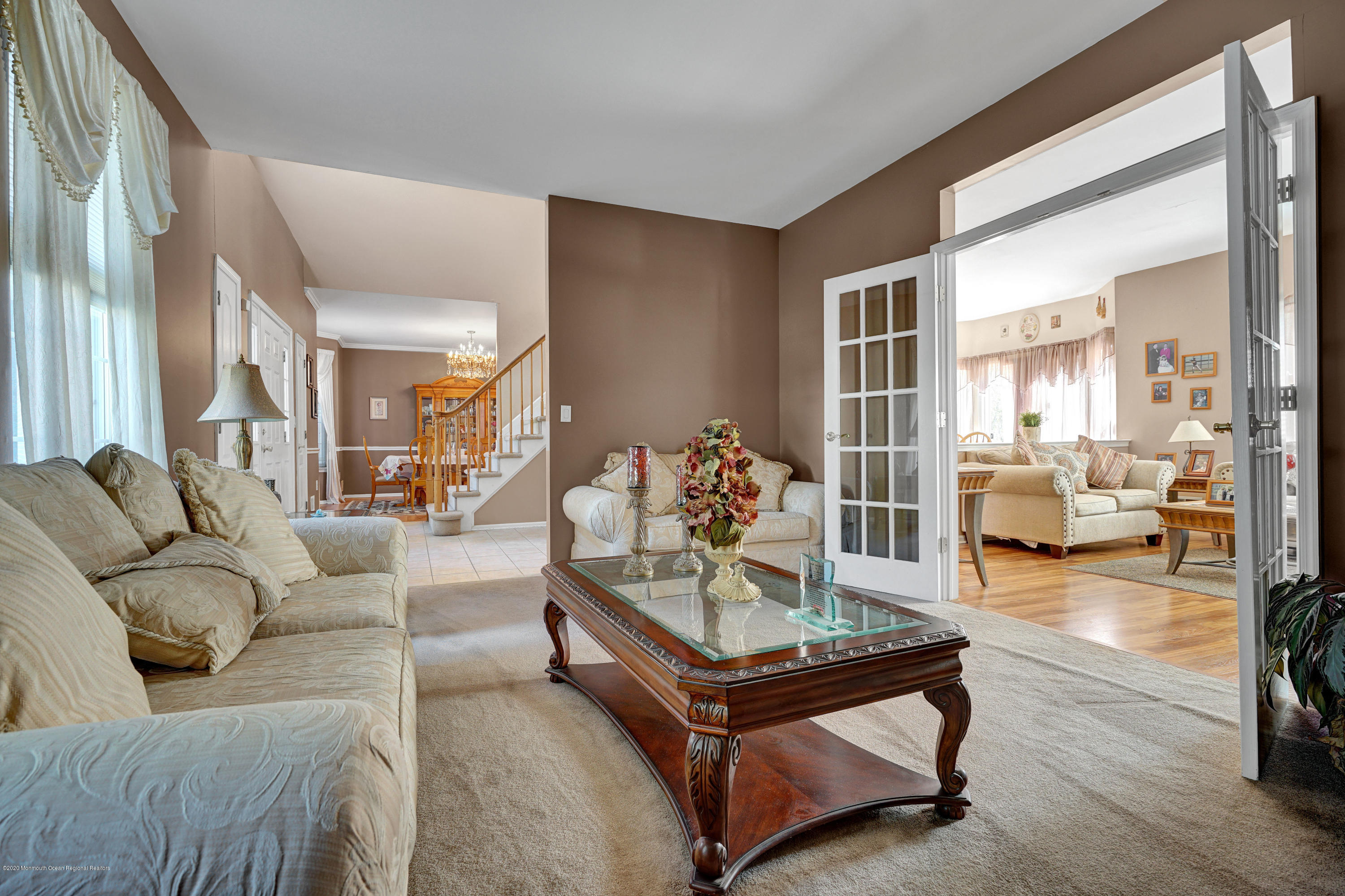 19 Cortelyou Road Jackson, NJ 08527 - Photo 25 of 56 a living room with furniture and a table