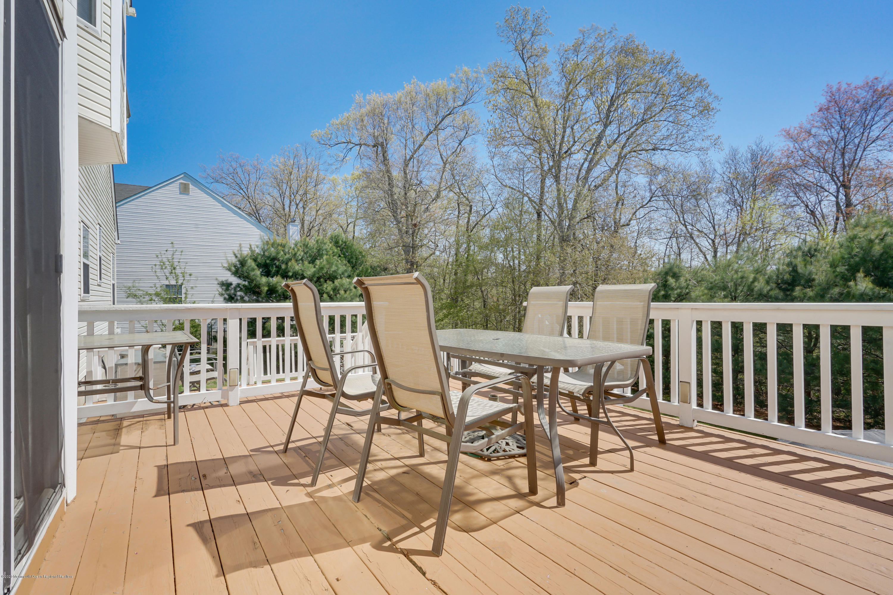 19 Cortelyou Road Jackson, NJ 08527 - Photo 3 of 56 a view of a chairs and table on the wooden floor