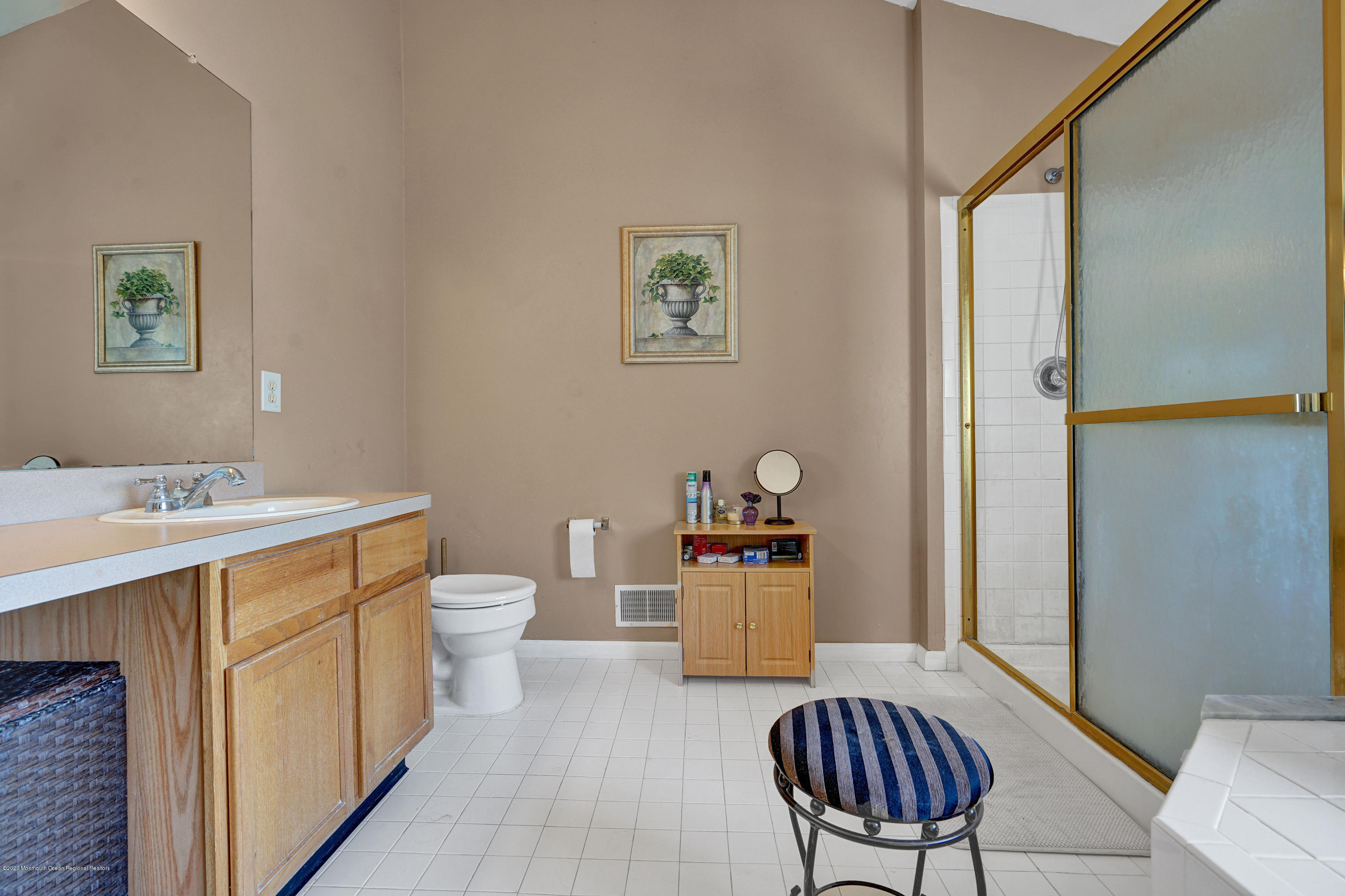 19 Cortelyou Road Jackson, NJ 08527 - Photo 35 of 56 a bathroom with a sink a toilet and a mirror