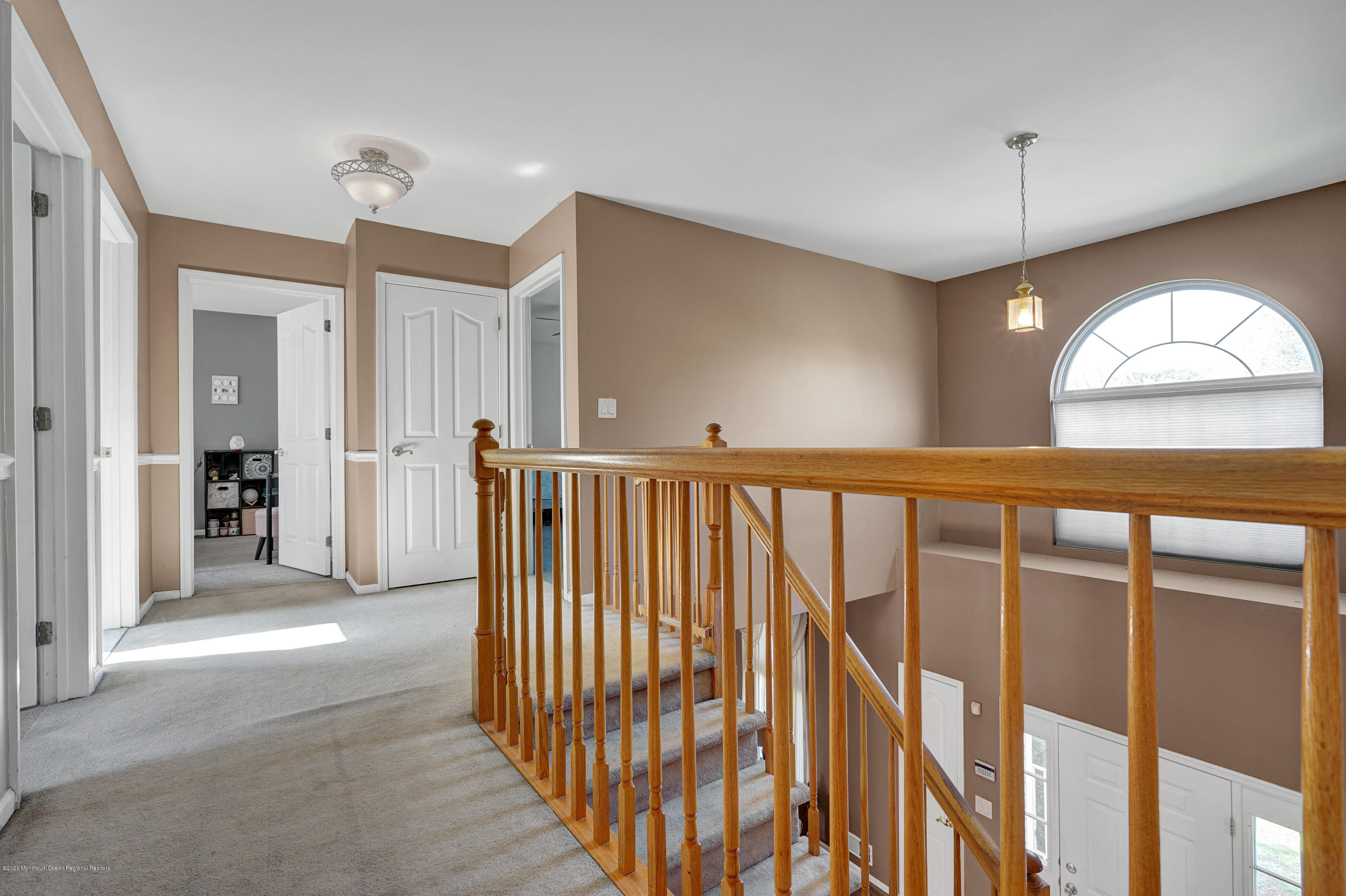 19 Cortelyou Road Jackson, NJ 08527 - Photo 44 of 56 a view of a hallway with entryway and chandelier