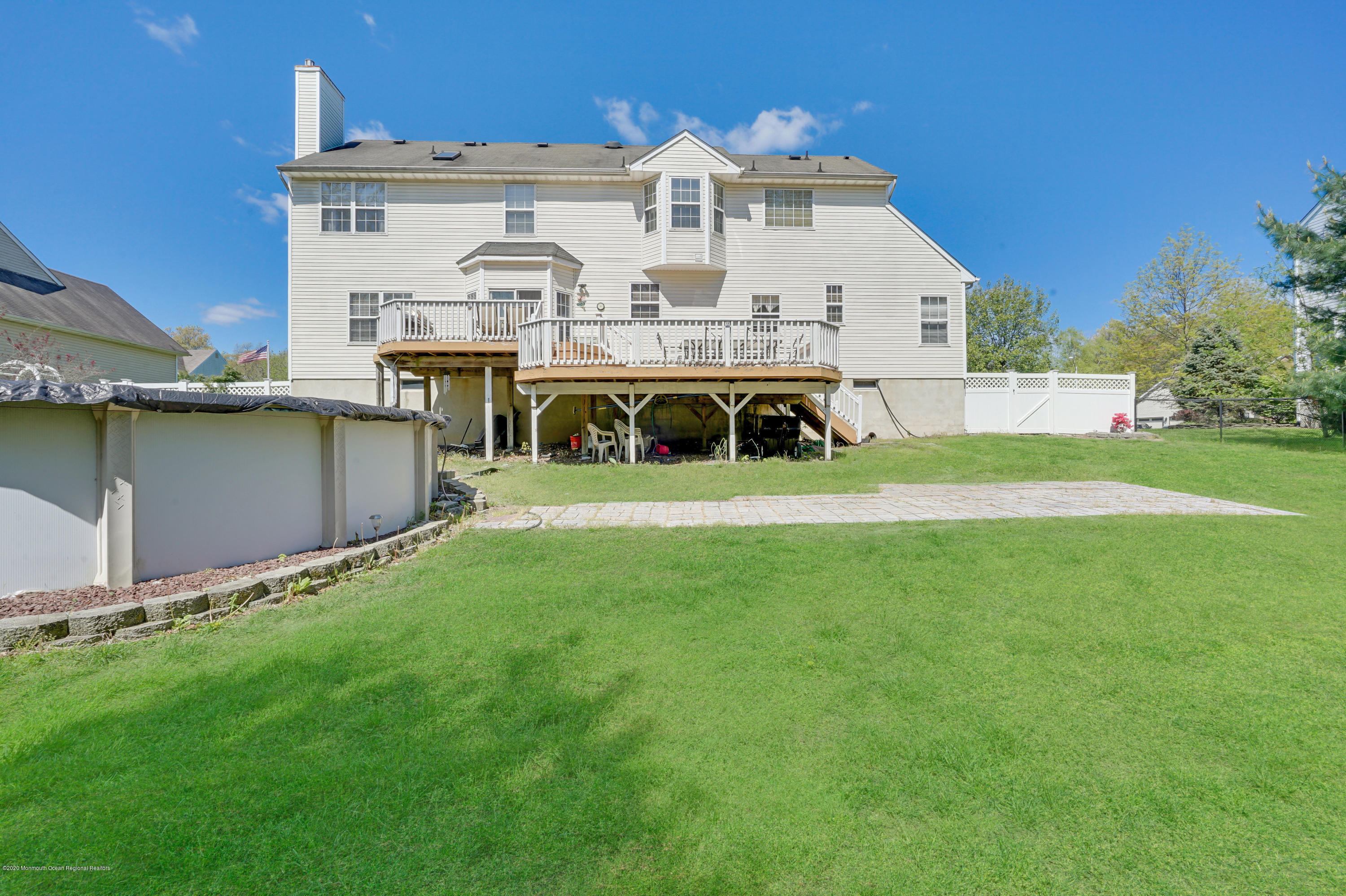 19 Cortelyou Road Jackson, NJ 08527 - Photo 50 of 56 a view of a house with a yard and sitting area
