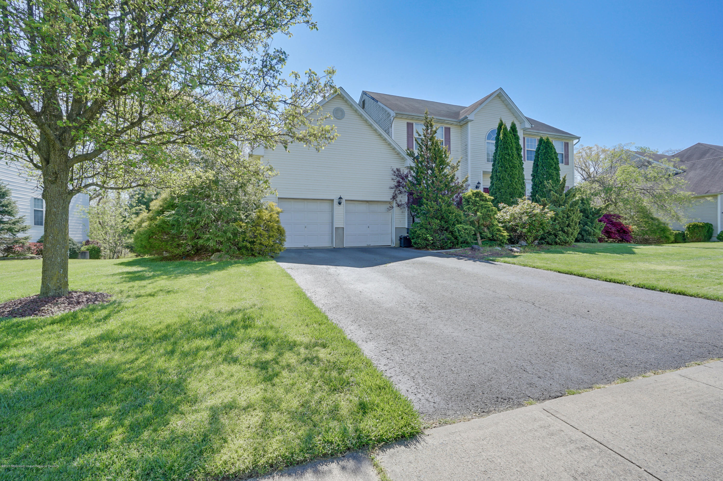 19 Cortelyou Road Jackson, NJ 08527 - Photo 55 of 56 a view of a house with a yard and tree s