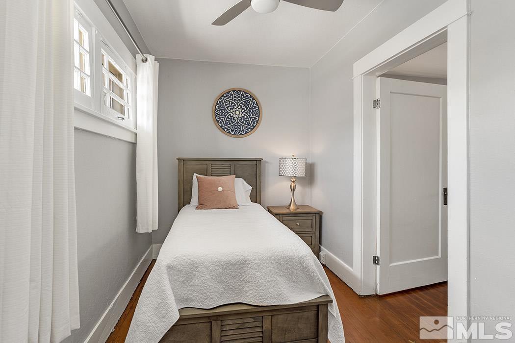 45 Keystone Avenue Reno, NV 89503 - Photo 26 of 29 a bedroom with a bed and wooden floor