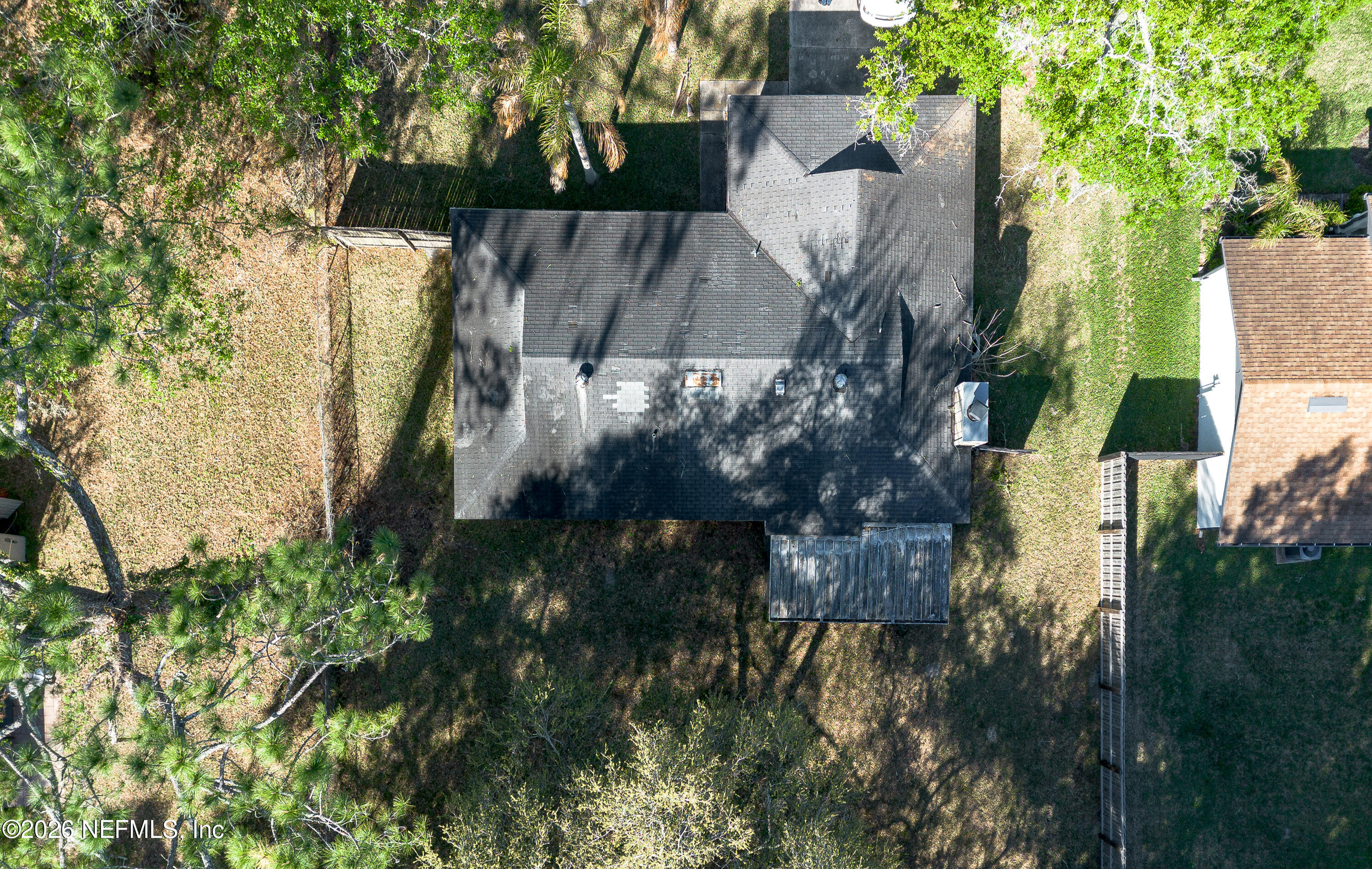 147 Knight Boxx Road Middleburg, FL 32068 - Photo 26 of 30 a backyard of a house with lots of green space