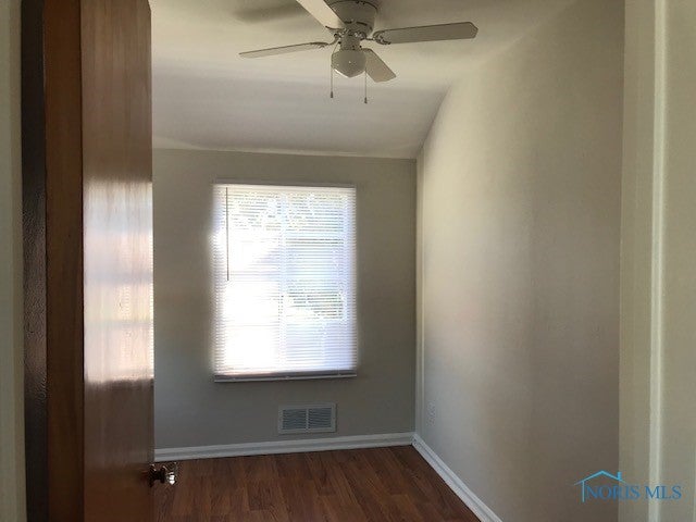 2536 Castleton Avenue Toledo, OH 43613 - Photo 7 of 21 Bedroom #3 with laminate flooring and a brand new overhead fan