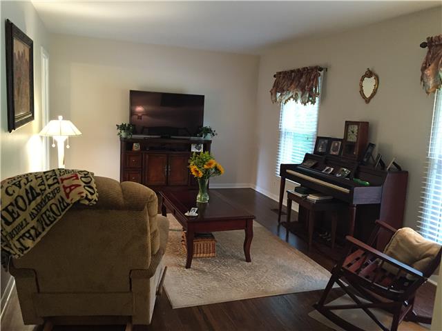 7345 Cavalier Road Nashville, TN 37221 - Photo 7 of 20 Living room with newly refinished hard wood floors