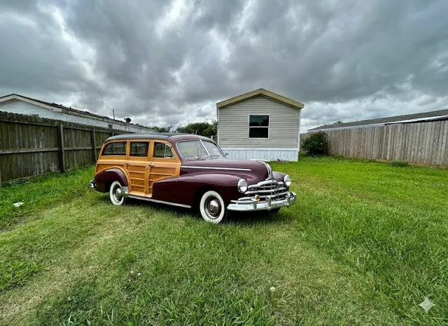 a view of a car in front of a house