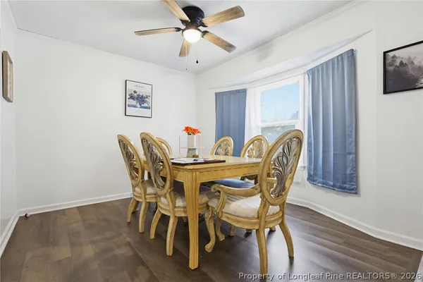 a bedroom with bed and a window