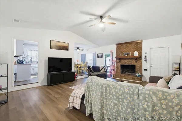 a white toilet sitting next to a bath tub