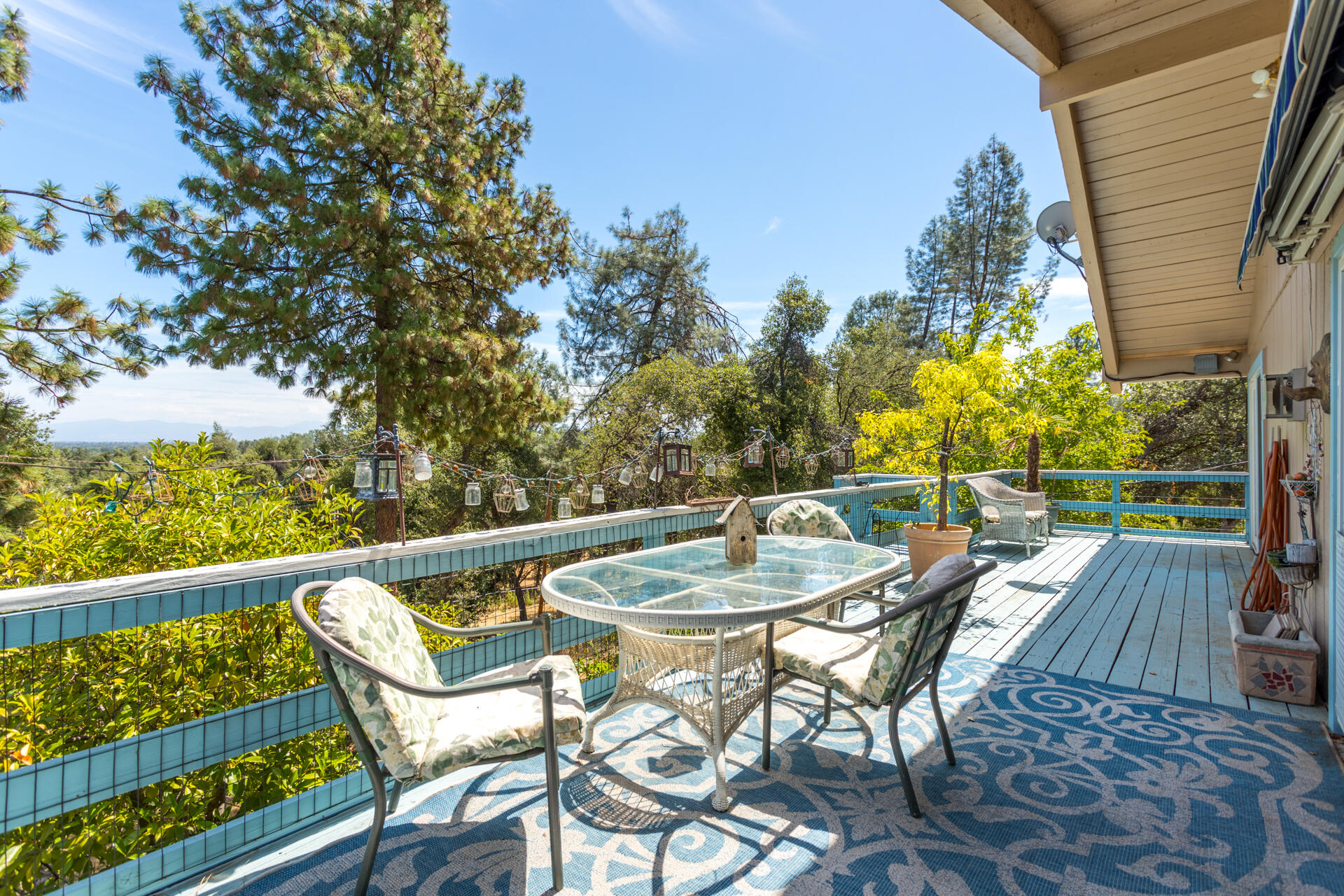 8695 Valley View Road Redding, CA 96001 - Photo 36 of 62 a view of a chairs and table on the balcony