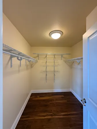 a view of a room with racks on the wall