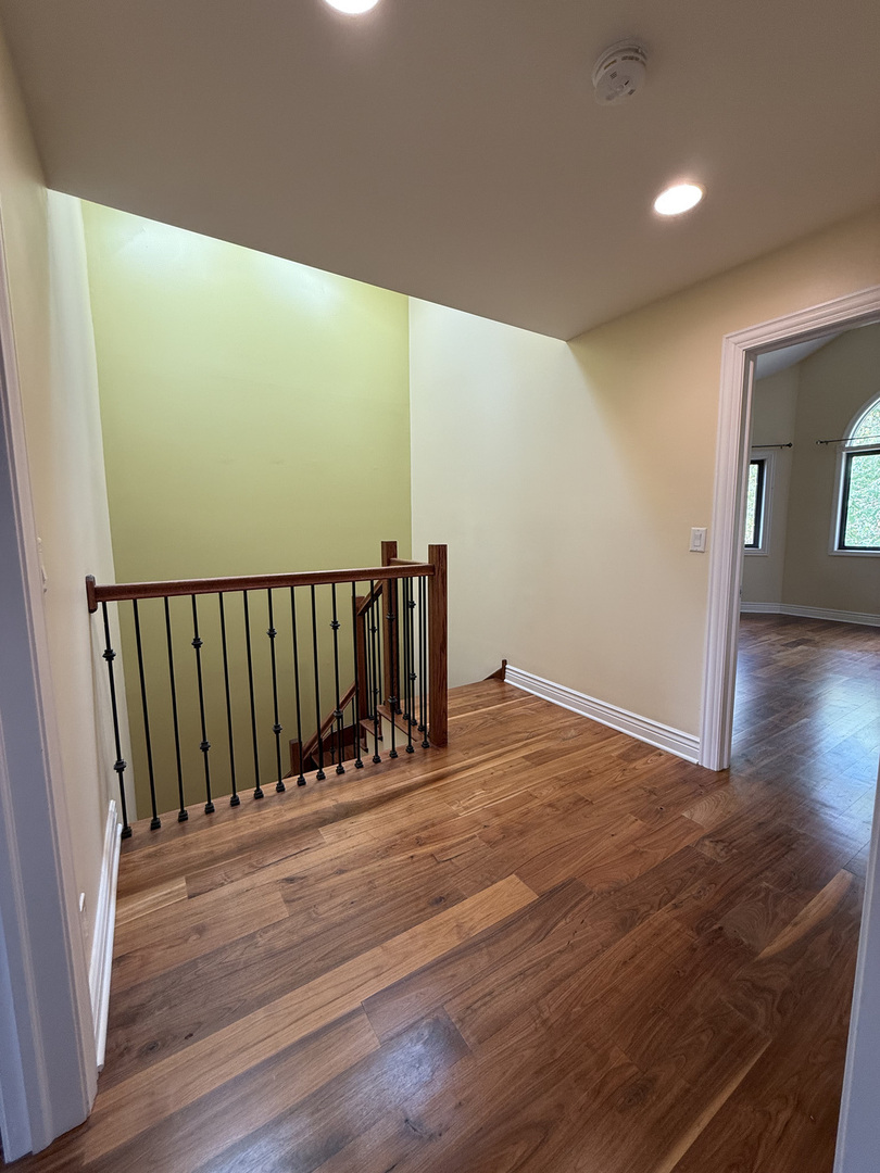 60 South Dee Road, Unit G Park Ridge, IL 60068 - Photo 21 of 23 a view of a room with wooden floor