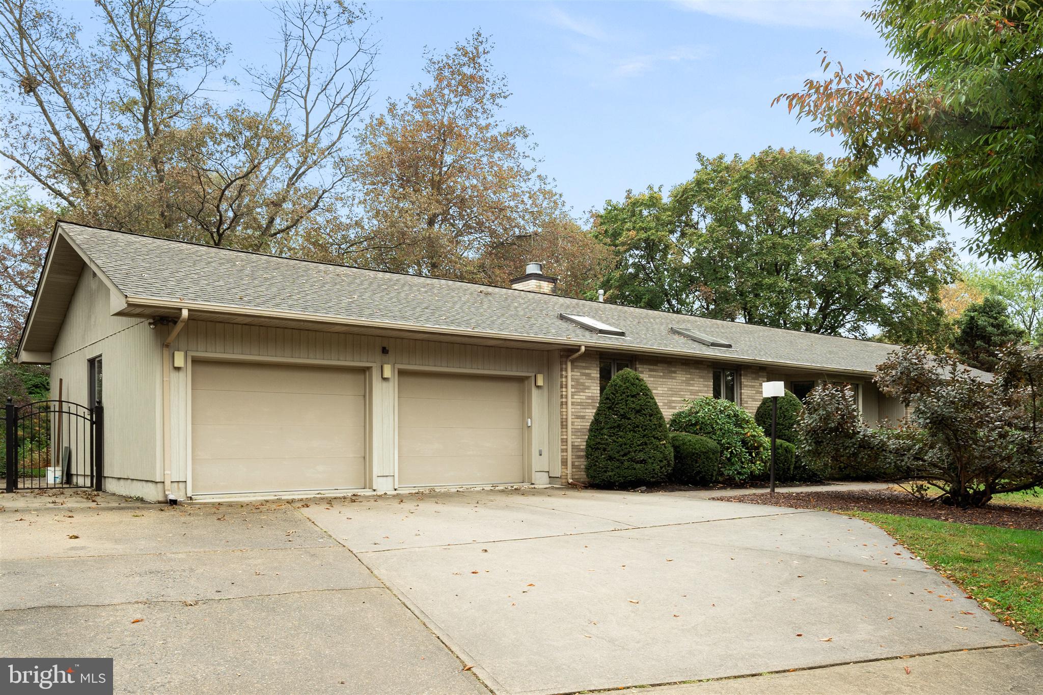 8 Lambert Lane Robbinsville, NJ 08691 - Photo 2 of 33 Concrete driveway with attached 2 car garage